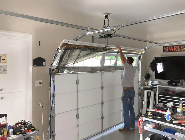 Garage door section replacement by Acushnet Garage Door Repair in Acushnet