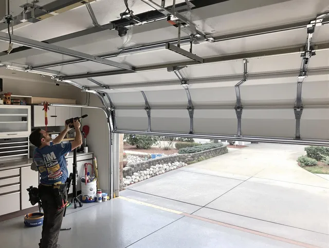 Garage door track repair service by Acushnet Garage Door Repair in Acushnet